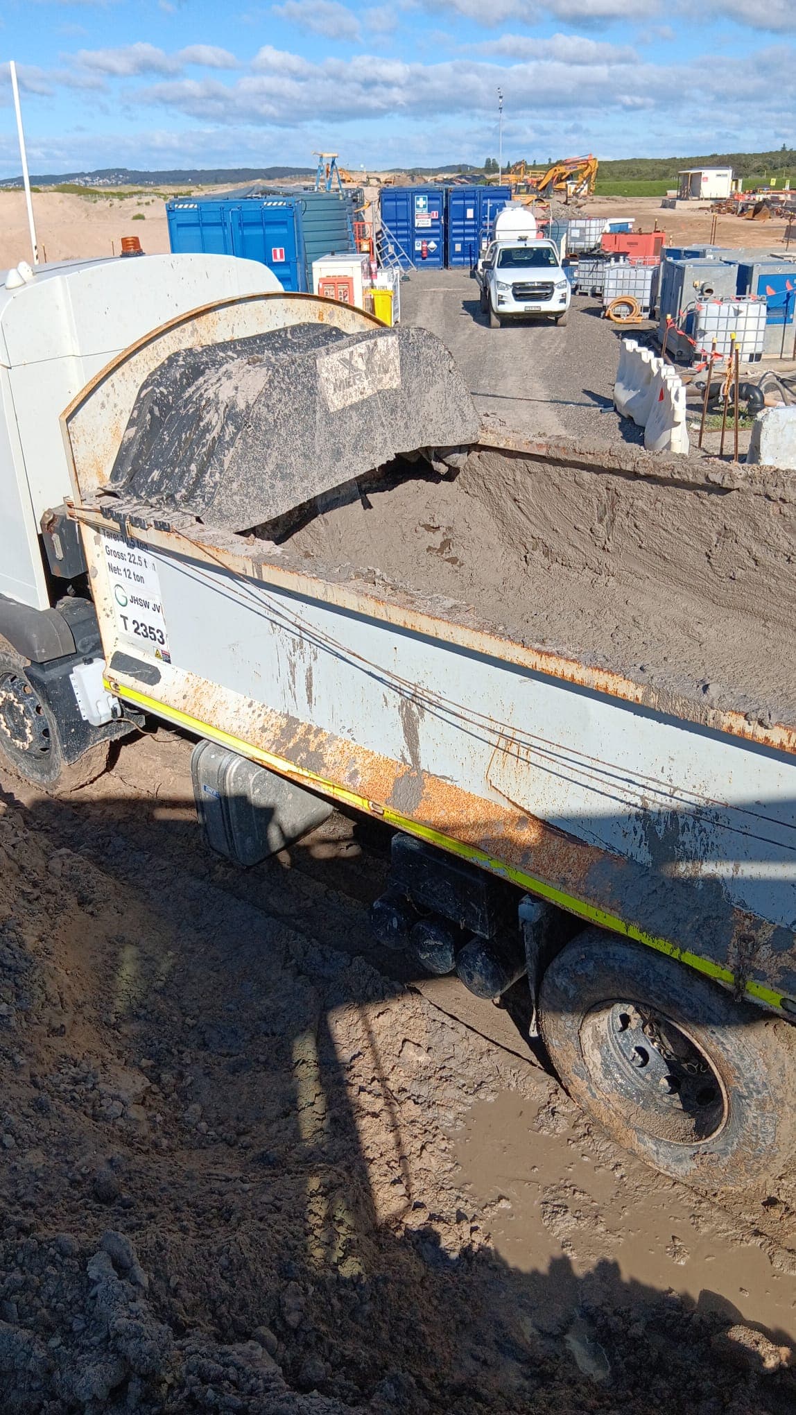 Civil project site with truck, materials and plant movement context, used to support Sagona Bros civil project readiness case study interpretation.